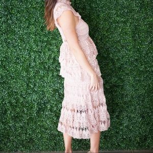 Pink lace midi dress.